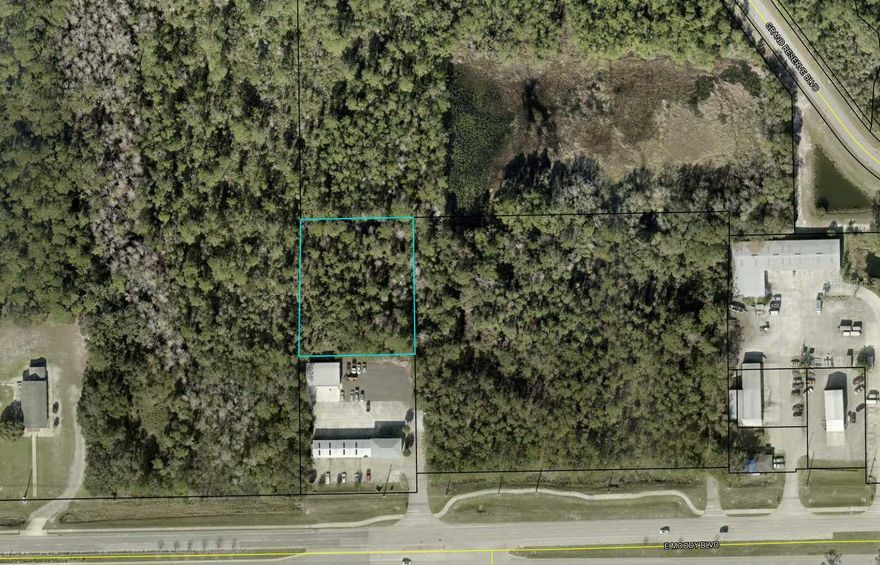 1.08 acre parcel off of SR100 main corridor in Flagler County. Possibilities include commercial warehouse to mutli-unit office building. Close to County government campus on high traffic count state road.