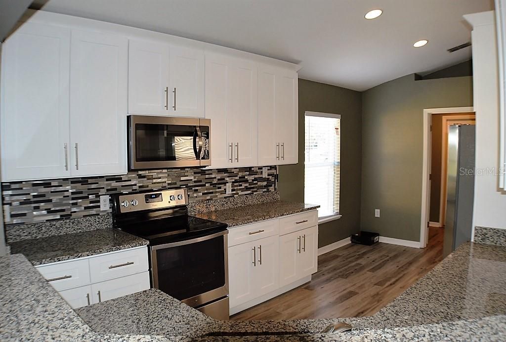 Photo of 1017 Tawny Eagle Drive, Groveland, FL 34736 (MLS # G5111924)