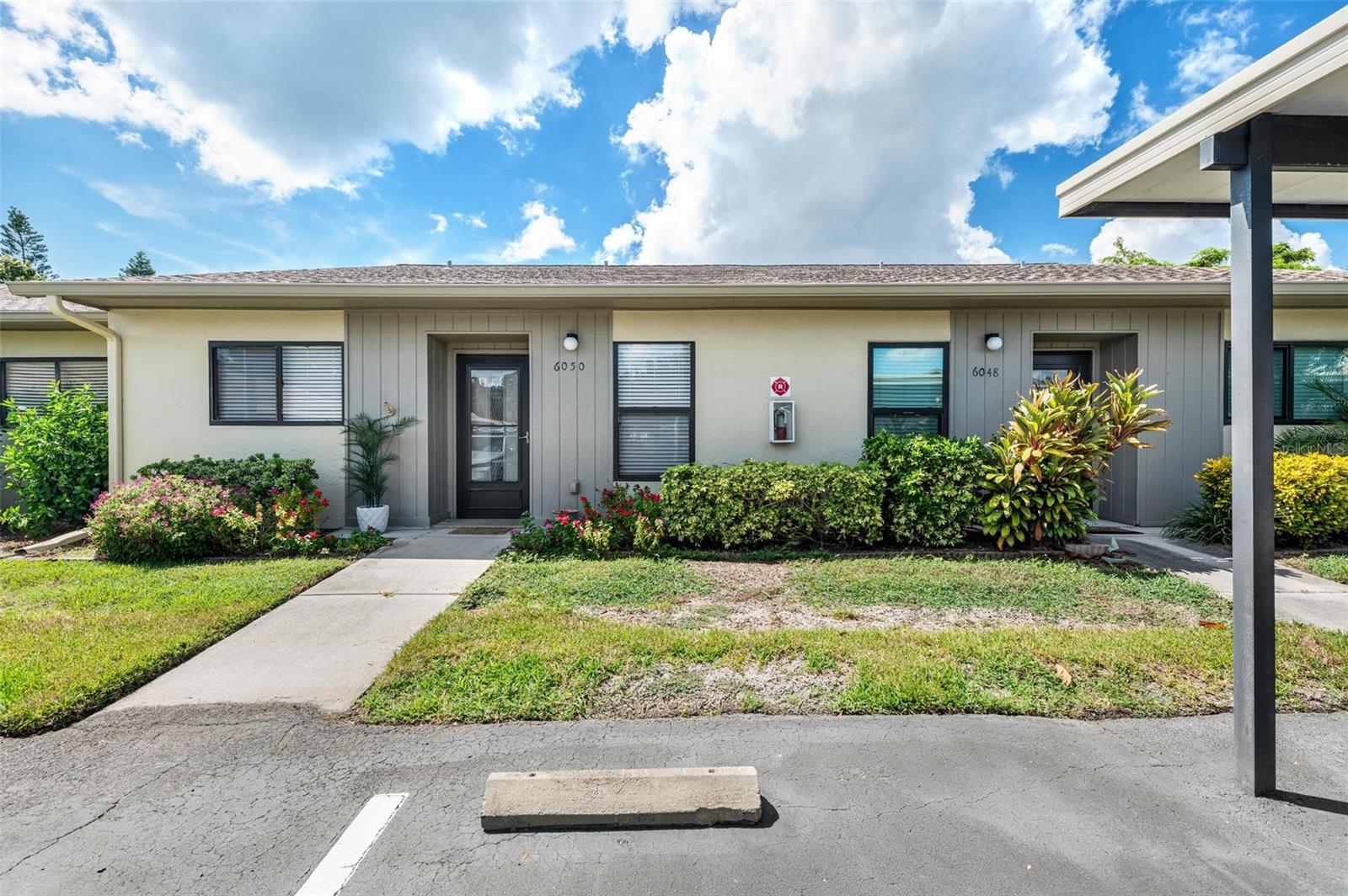 Welcome to the picturesque community of Huntington Woods, where the Florida dream of peaceful serenity is achieved. Beautifully updated and meticulously maintained, this stunning two-bedroom, two-bathroom home is ideal. With coastal chic vibes coursing through its veins, the aesthetic is sure to impress. As is often the case, the kitchen is the heart of the home, and a chef’s delight. Offering ample prep space to prepare gourmet meals, the quartz countertops are nothing short of stunning. The neutral beautiful backsplash, light cabinets and light appliances completely compliment the coastal chic aesthetic. The large combination living room and dining space opens nicely to the kitchen making entertaining a breeze. The waterproof vinyl floors are not only gorgeous but also easy to maintain. Both bedrooms are rather spacious and offer the perfect sanctuary after a long day enjoying our tropical climate. If a morning cup of coffee or evening cocktail is desired, the enclosed lanai/sunroom is the perfect place to indulge. For additional peace of mind, the AC unit was replaced in 2023, so no need to worry about that large expense. Other than some personal items, this home is being offered furnished which is perfect to move right in and enjoy! Huntington Woods is a short drive to the beach, extremely close to SCF and under ten minutes away from the airport, making the location superb. Amenities are plentiful, including a refreshing community pool, fantastic cable package, beautiful fountain ponds and more! Perfectly located with an updated coastal chic vibe, this is an exceptional place to call home! Remaining furnishings are also negotiable for a perfect move-in!