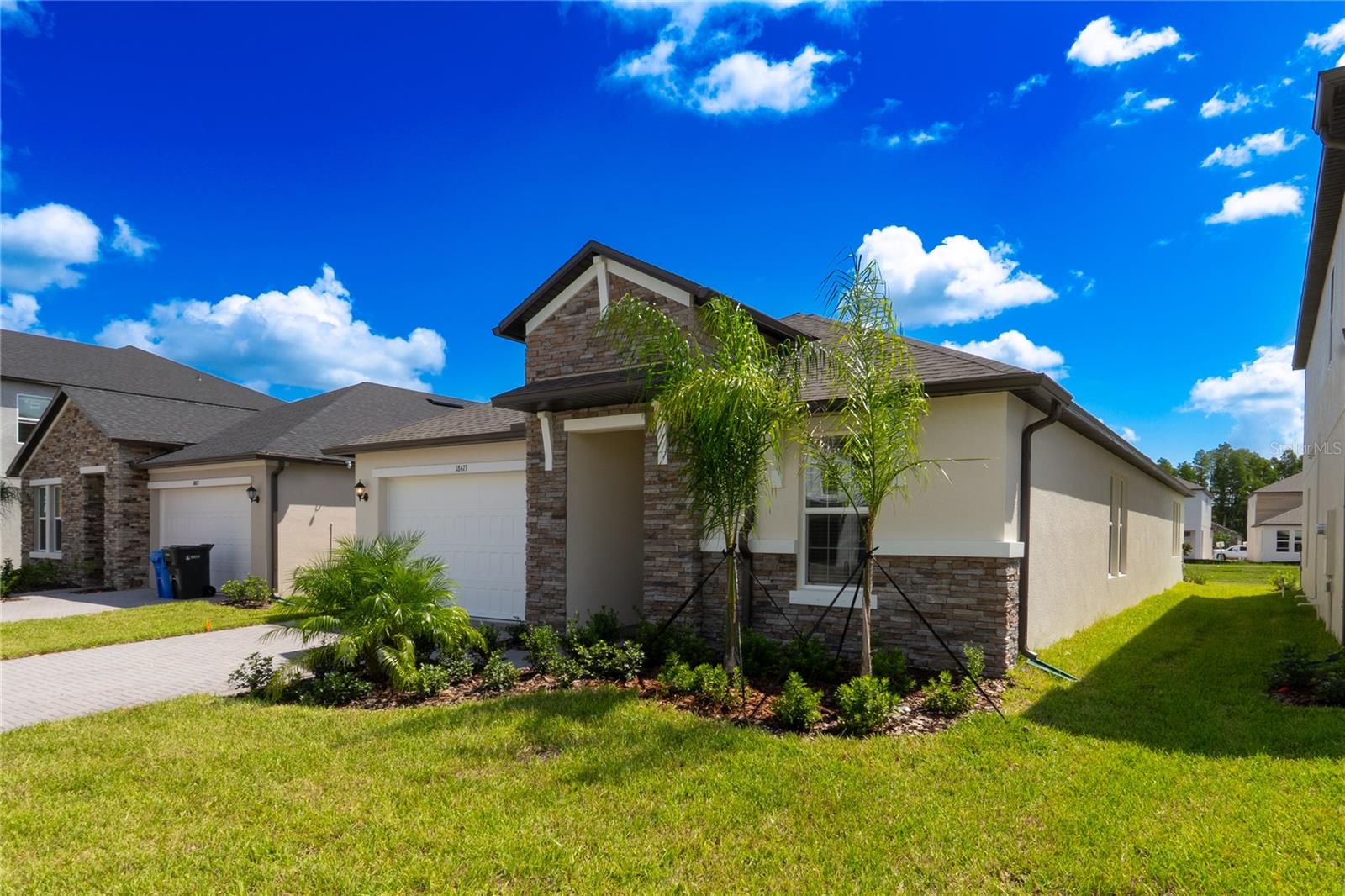 Be the first to call this brand-new home in the heart of Lutz yours. This thoughtfully designed one-story residence offers 3 spacious bedrooms, 3 full baths, a versatile office/den, and a 2-car garage, providing comfort, flexibility, and modern convenience. With fresh paint still in the air, the home feels truly pristine, and its open layout makes it perfect for both everyday living and entertaining. Large windows frame peaceful pond views, creating a relaxing backdrop right in your backyard.
Located within Hillsborough County’s top-rated school district, this home combines serenity with everyday convenience. Lawn care, high-speed internet, pest control, trash, and recycling are all included. Beyond the front door, Lutz offers the perfect blend of small-town charm and easy access to the city. Residents enjoy beautiful parks, nature preserves, and scenic trails, as well as premier golf courses like TPC Tampa Bay. Just minutes away, you’ll find Tampa Premium Outlets and Cypress Creek Town Center for endless shopping and dining options, while downtown Tampa, major employers, and Tampa International Airport are all within a short drive.
This home offers more than a place to live—it offers a lifestyle, where tranquility and convenience meet. Don’t miss the opportunity to be the very first resident of this stunning Lutz retreat.