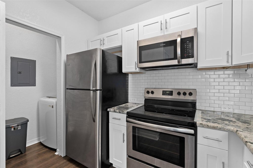 Photo of 2717 Maitland Crossing Way #205, Orlando, FL 32810 (MLS # O6440740)