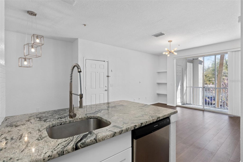 Photo of 2717 Maitland Crossing Way #205, Orlando, FL 32810 (MLS # O6440740)