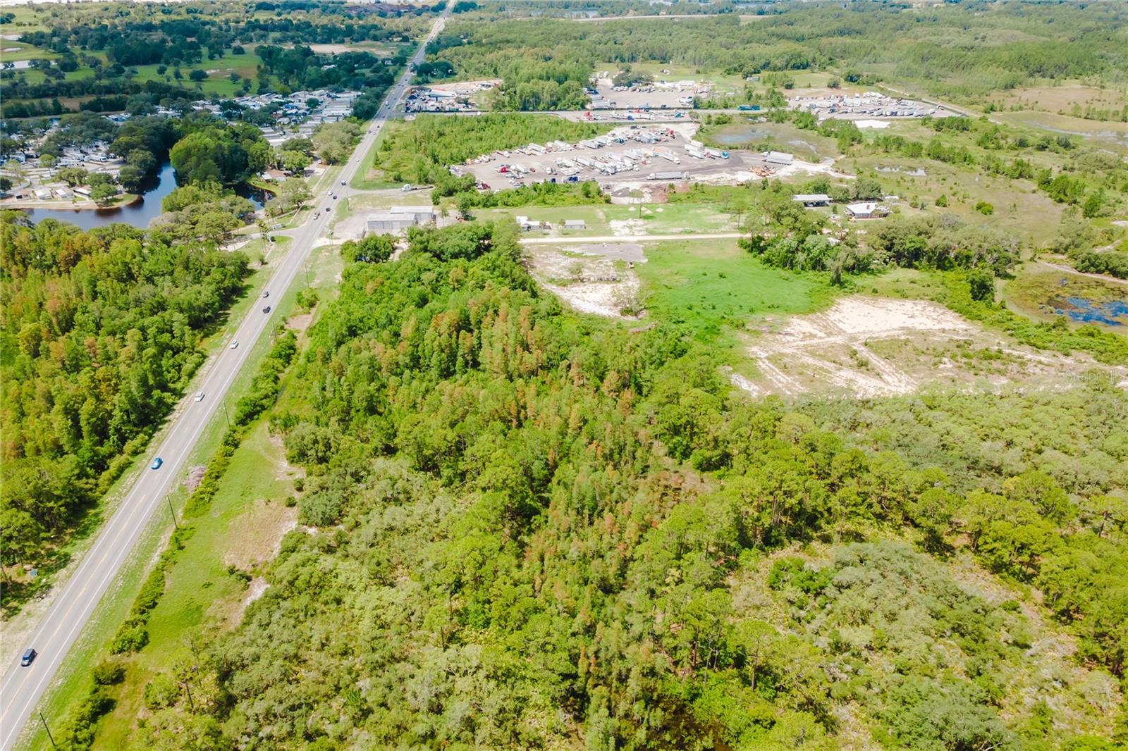 FOR SALE – Prime Industrial/Commercial Development Site | 11.6 Acres in Davenport, FL
Incredible opportunity to acquire a strategically located 11.6-acre property in the fast-growing Davenport area. The land features:
10 acres fronting US Highway 17-92, offering high visibility and direct access to a major traffic corridor.
1.6-acre secondary parcel with independent access from Sunny Acres Road, providing flexible ingress/egress options.
This property is zoned and suitable for industrial and commercial development, with a site plan already in progress for the construction of 13 warehouse units (project layout available in attachments/photos).
Dual frontage: US17-92 and Sunny Acres Rd.
A project is currently being developed for a 1.6-acre warehouse and office space with an entrance on Sunny Acres Street. Model and drawing attached.
High-growth corridor with increasing commercial demand
Flexible use potential: warehouses, light industrial, distribution, or mixed-use
A portion of the site contains wetlands, located toward the rear of the property, not affecting the prime buildable area
Excellent opportunity for developers, investors, and commercial builders
The property consists of three contiguous parcel IDs, totaling approximately 11.6 acres.
Location Advantage:
Surrounded by ongoing commercial and residential developments, this site is perfectly positioned for immediate or phased construction. Easy access to I-4 and key Central Florida markets.