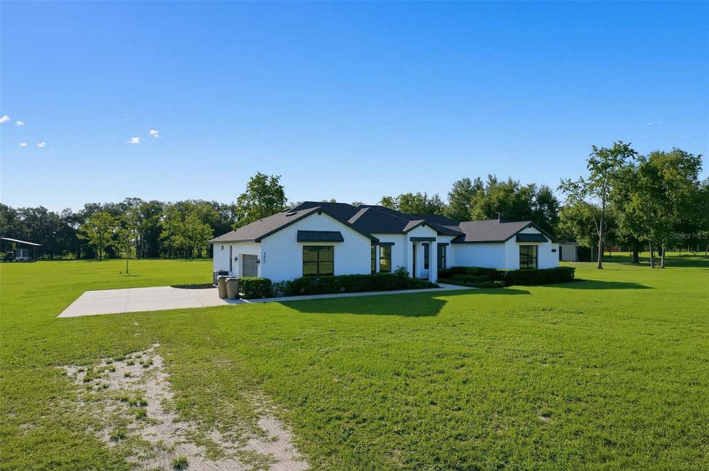 Photo of 4650 Lake Pickett Drive, Groveland, FL 34736 (MLS # O6436733)