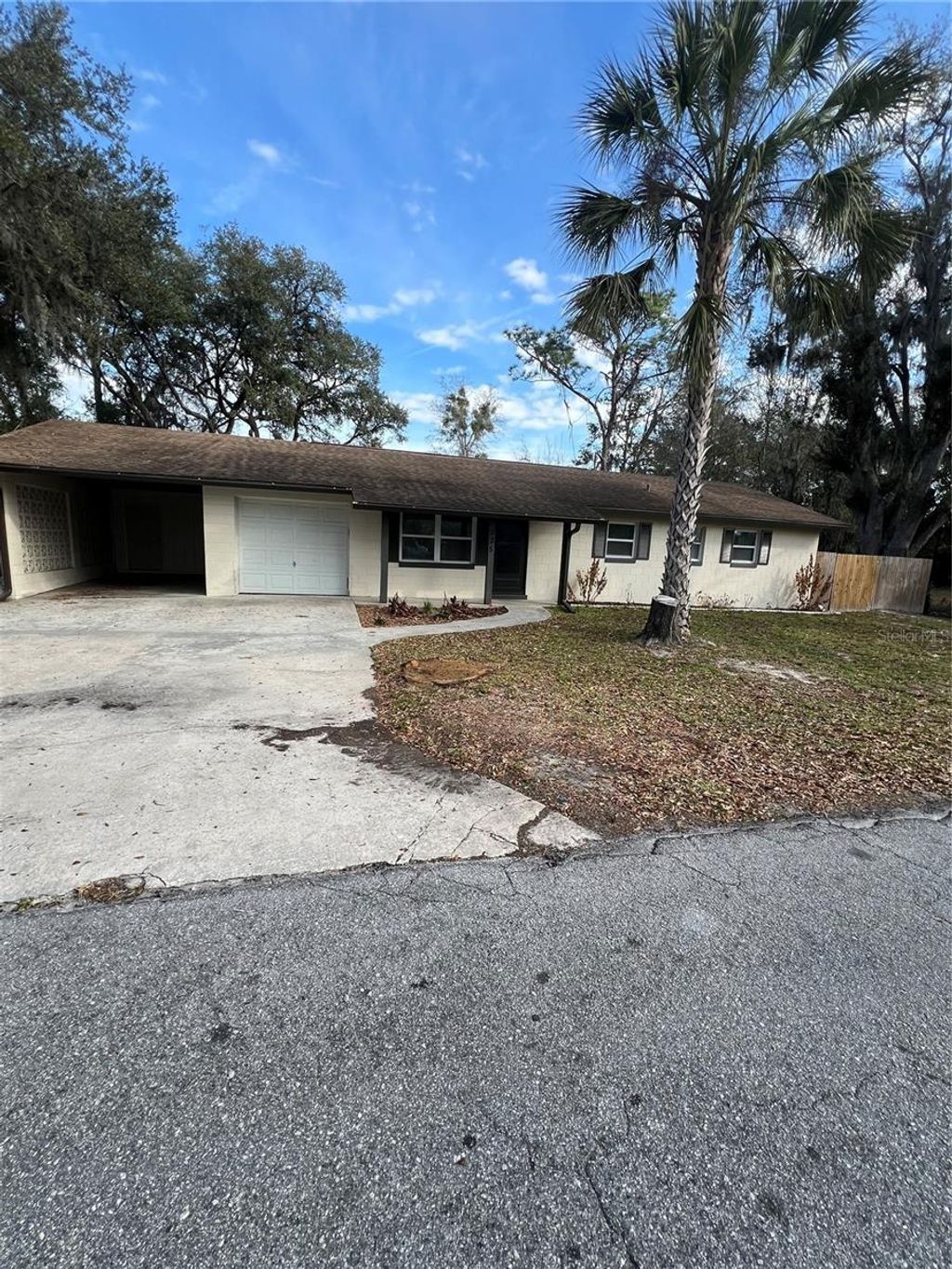 Photo of 935 NE 5th Terrace, Crystal River, FL 34428 (MLS # W7883396)
