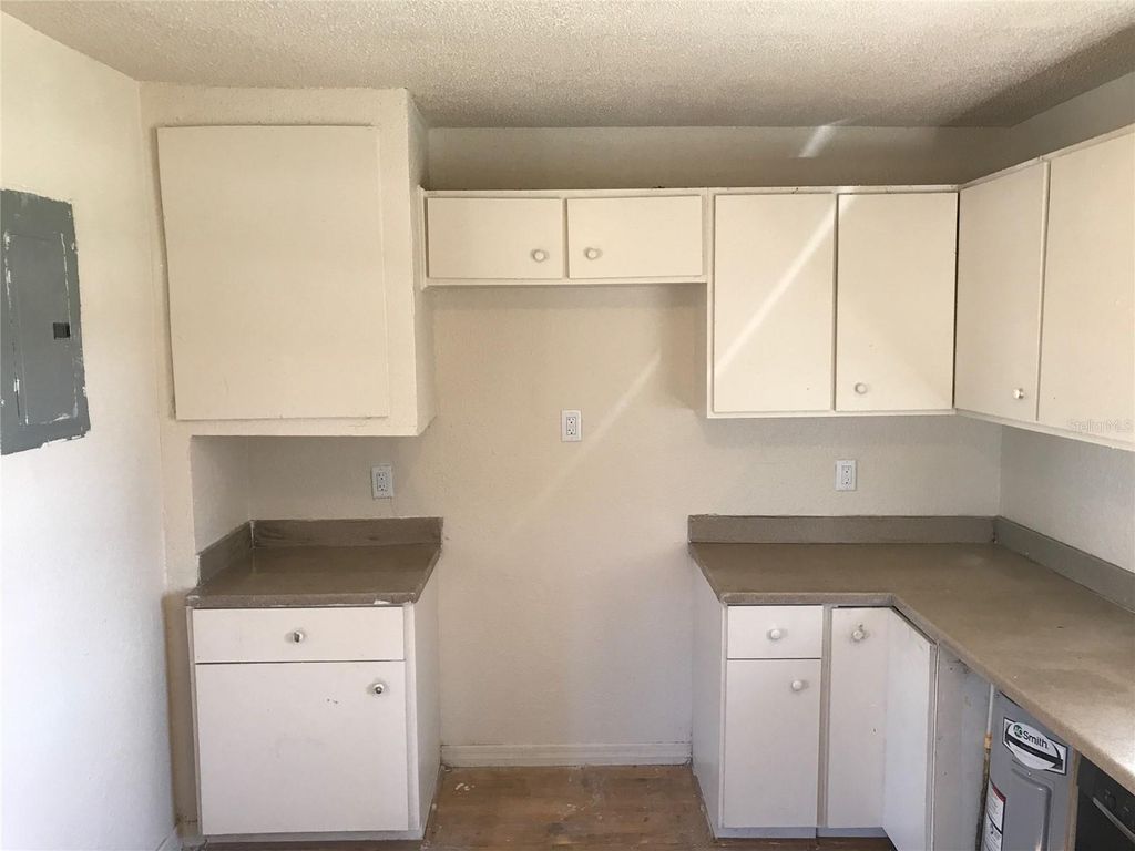 Photo of 353 Pearlwood Street, Orlando, FL 32811 (MLS # O6356342)