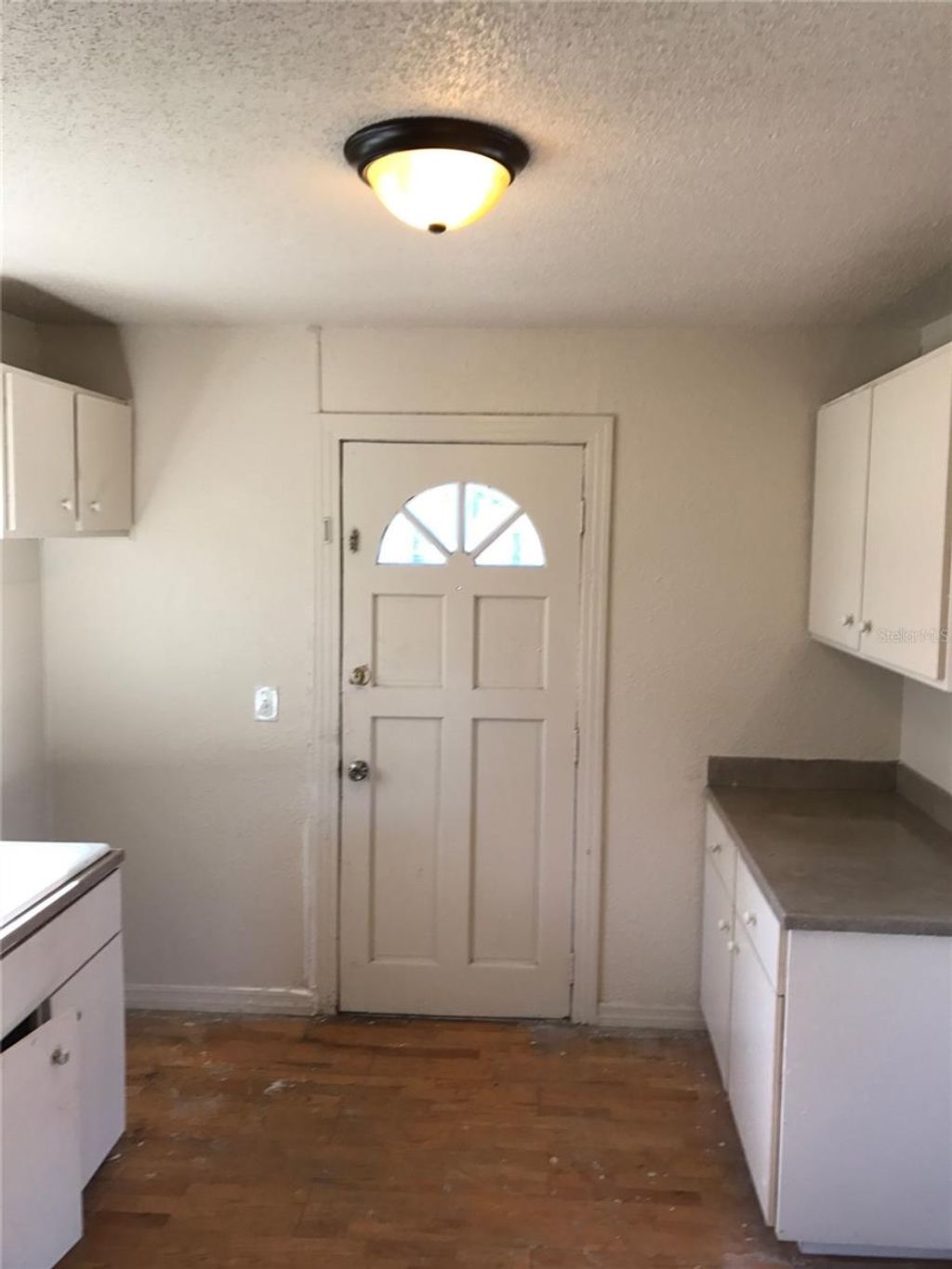 Photo of 353 Pearlwood Street, Orlando, FL 32811 (MLS # O6356342)