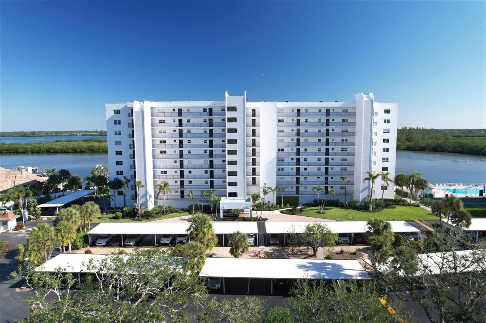 OPEN FOR SEASON 2025! Siesta Key Resort Style Vacation Rental, you will love the fabulous renovation these owners have done, everything is brand new and the aboslute best! The kitchen has been updated with gorgeous cabinets, a stunning Quartz waterfall countertop, there is a breakfast bar as well as dining table, and stainless appliances. All new furniture throughout and amazing views of the water from almost every room. The primary bedroom has a King bed and flat screen TV, the guest bedroom has a Queen bed and all closets have built-ins. Both baths are all new, with designer finishes, including back-lit mirrors. The large screened patio offers views of the intracoastal waterway and beyon, and has a full size washer and dryer for your convenience. Wi Fi througout, and streaming options for TV viewing. This gated and secure community has a fishing pier, kayak launch, fitness room, clubhouse and tennis courts, and you are just a short stroll to Turtle Beach! Take the free Trolley to the Siesta Key Village for shopping, dining and entertainment.