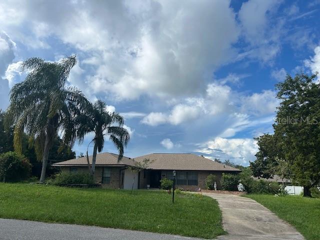 Professional Photos Coming Soon -- First Time on the Market!! Nestled in the sought-after Deltona Lakes community of West Volusia County, this ONE-STORY RANCH HOME sits on a rare DOUBLE LOT with MATURE FRUIT TREES and endless possibilities—whether you envision building a second home, creating a private garden oasis or simply enjoying the extra space. Just 45 minutes to New Smyrna Beach or Downtown Orlando, this 3 BEDROOMS, 2 FULL BATH home includes a Versatile Bonus Room, a 2 CAR GARAGE and a LARGE POOL with SCREENED PATIO and FENCED DECK. Inside, the floor plan features a SPACIOUS LIVING and DINING AREA with VAULTED CEILING, a cozy FREE STANDING WOOD STOVE and a wall of sliders that open to the backyard retreat. A welcoming foyer with a generous storage closet and a picture window at the front of the home add to the sense of space and light. The kitchen includes a BREAKFAST BAR and PASS-THROUGH WINDOW for easy entertaining, while the primary suite features an adjoining BONUS SPACE—ideal for a home office, nursery, or gym. SECONDARY BEDROOMS are WELL-SIZED and share a full bath with a JETTED TUB/SHOWER combo and LARGE VANITY. Additional features include a laundry room with utility sink and built-in storage, a LIGHT OAK LAMINATE FLOOR TROUGHOUT (no carpet), and a ROOF REPLACED IN 2021 with architectural shingles. SELLER PAID ONE YEAR HOME WARRANTY INCLUDED!
This home presents an incredible opportunity for a buyer to add their personal touches and unlock its full potential. With its PRIME LOCATION, SPACIOUS LAYOUT, and OVERSIZED LOT - this is truly a property with room to grow. This property may be under audio or visual surveillance.
