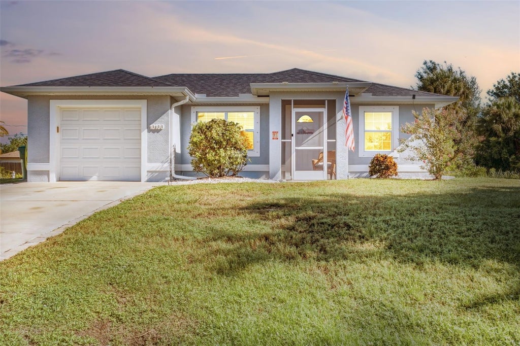 Photo of 10100 Amelia Avenue, Englewood, FL 34224 (MLS # C7530181)