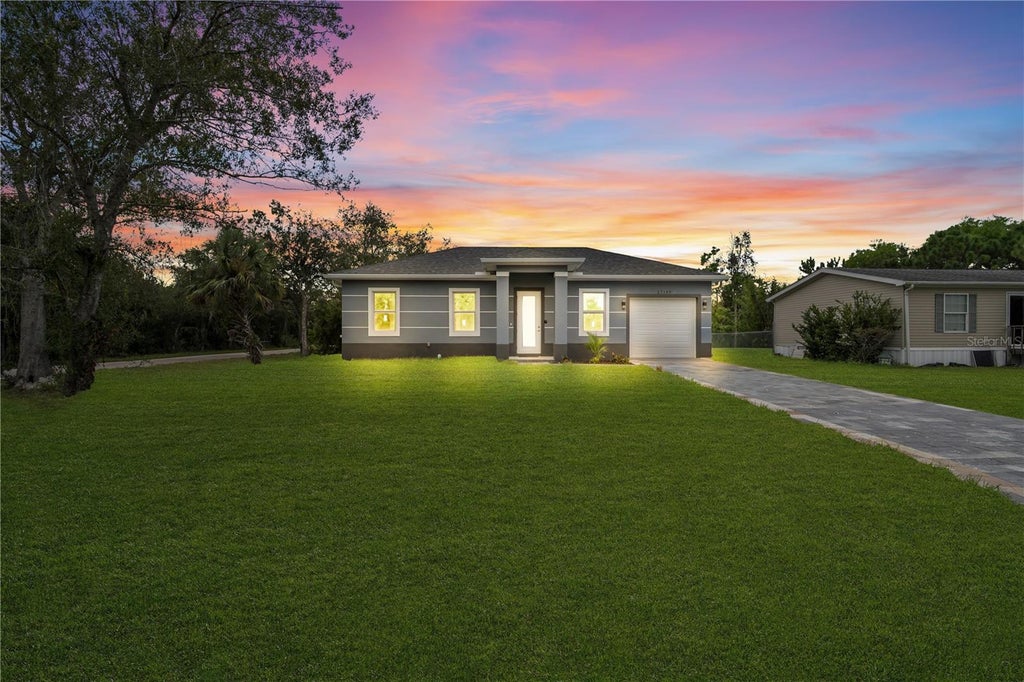 Photo of 27149 Aloha Dr, Punta Gorda, FL 33955 (MLS # C7531837)
