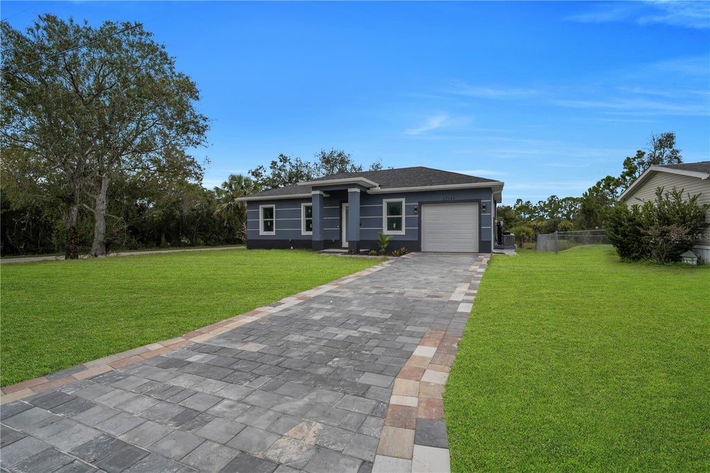 Photo of 27149 Aloha Dr, Punta Gorda, FL 33955 (MLS # C7531837)