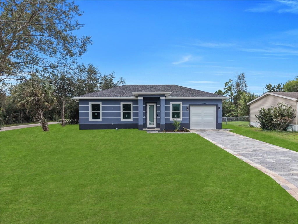 Photo of 27149 Aloha Dr, Punta Gorda, FL 33955 (MLS # C7531837)