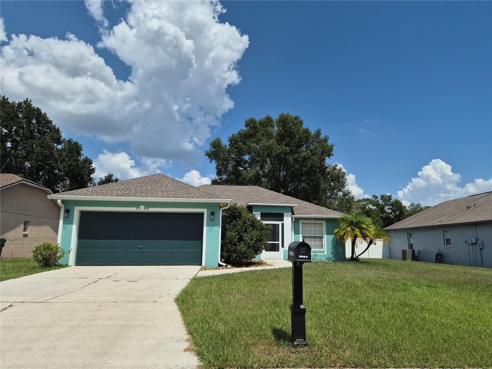 Location, an open floor plan and sprawling yard are just a few highlights of this fantastic North Lakeland home. Step inside where new luxury vinyl floors and fresh neutral paint enhance the vaulted ceilings and create a welcoming flow into the kitchen and family room. You'll love the versitility of the breakfast bar, whether it's for enjoying a quiet meal, serving up dinner "buffet style" for the family or everyone's favorite snacks while watching the big game. Outside, the yard is just as inviting because not only is there an oversized screened patio area to keep the bugs out, but it's fully fenced and has endless possibilities whether playing some yard games or enjoying a nice quiet evening from the lanai. With 3 bedrooms, 2 bathrooms and 2 car garage, this home is perfect for everyone, whether you need room to grow or enjoy having extra bedrooms for guests or hobbies. As an added bonus, the living room, kitchen and lanai all have Kasa Wi-Fi smart switches that are Alexa enabled. Other recent updates include roof (2023), A/C (2018) and new vanity in primary bathroom. Call today before your dream home is gone.