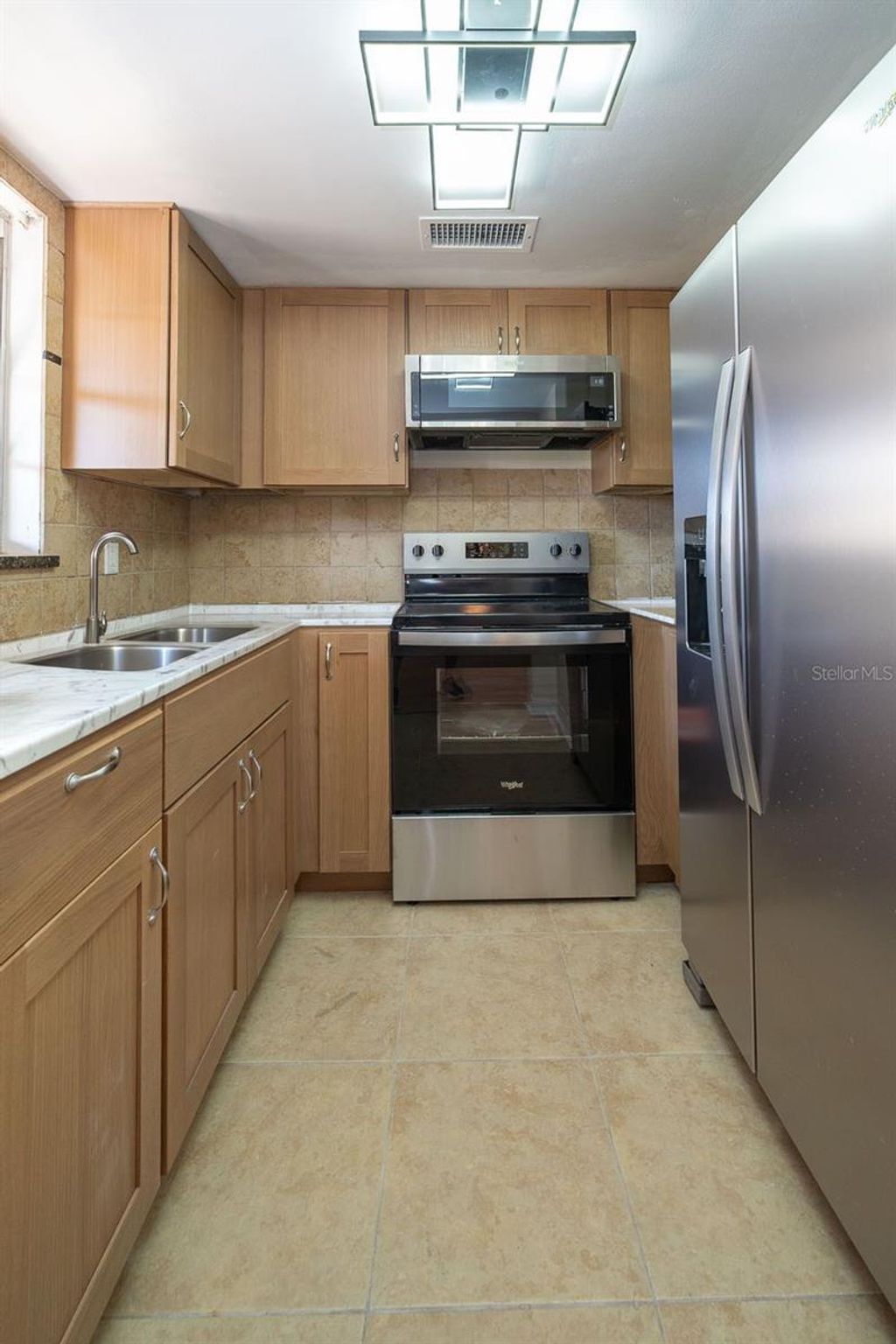 Photo of 4807 Marine Parkway #103, New Port Richey, FL 34652 (MLS # TB8487802)