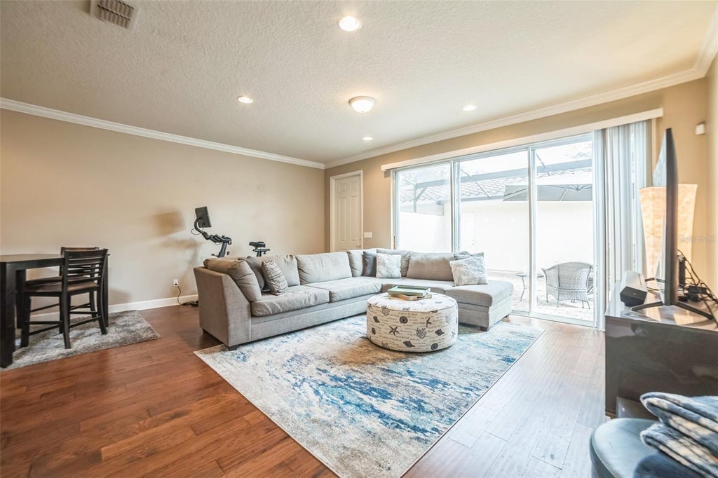 Photo of 12129 Breda Lane, Orlando, FL 32827 (MLS # O6435277)
