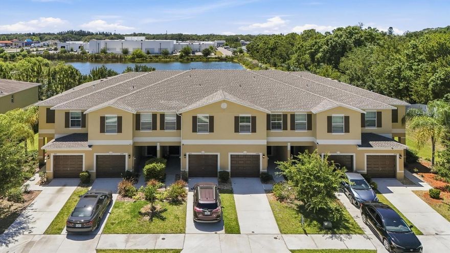 Beautifully maintained 2-bedroom, 2.5-bath townhome with attached 1-car garage located in the highly desirable Summerfield Crossings community of Riverview. Built in 2018, this home offers an open-concept floor plan designed for comfortable living and easy entertaining. The spacious kitchen features wood cabinetry, ample counter and cabinet space, pantry storage, and overlooks the living and dining areas. Tile flooring runs throughout the main level, while the upstairs bedrooms and staircase feature carpeting for added comfort.
Upstairs you’ll find a versatile loft space ideal for a home office, media area, or flex space, along with two bedrooms and a convenient upstairs laundry area. The primary suite features a walk-in closet and private en-suite bathroom with dual sinks and a walk-in shower. Additional features include abundant natural light and beautiful pond views that can be enjoyed from both the downstairs dining area and upstairs bedroom. Relax on the screened lanai overlooking the peaceful water view.
Summerfield residents enjoy resort-style amenities including multiple pools, fitness center, tennis and basketball courts, playgrounds, dog park, walking trails, ball fields, community events, and a public golf course. HOA includes exterior maintenance for low-maintenance living. Conveniently located near shopping, dining, hospitals, VA Medical Center, I-75, Hwy 301, and the Selmon Expressway for an easy commute to Tampa, Brandon, MacDill AFB, and surrounding areas. NO CDD!