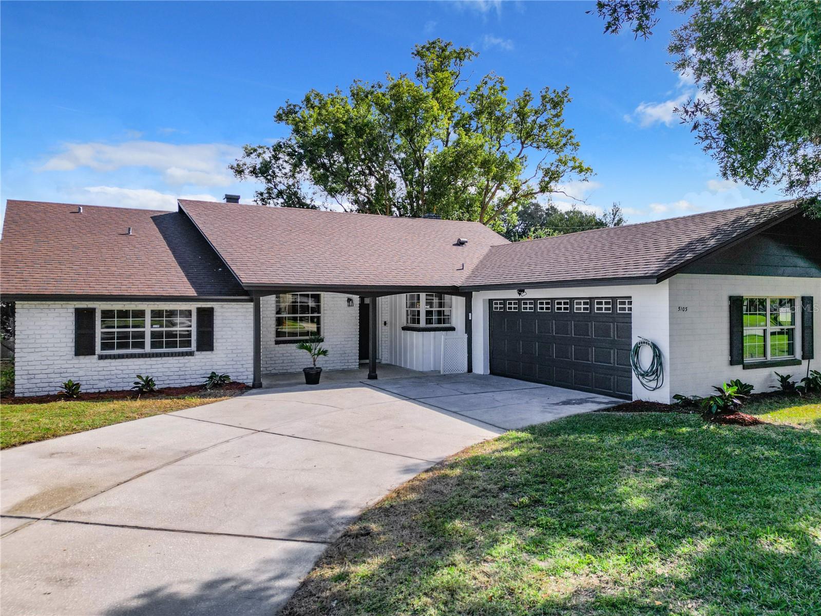 Welcome to your dream home in the desirable community of Belle Isle, Florida. Nestled in a serene and picturesque neighborhood, this immaculate residence offers the perfect blend of modern luxury and classic charm. Boasting 3 bedrooms, 2 bathrooms, and a wealth of upgraded amenities, this property is a testament to comfortable living. With spacious interiors the open floor plan seamlessly connects the living, dining, and kitchen spaces, providing a perfect flow for entertaining and an original wood burning fireplace for those quiet cozy days. The three bedrooms are generously sized, each offering a tranquil retreat. The master suite is a haven of comfort with an ensuite bathroom and a walk-in closet, creating a private oasis within your own home. Both bathrooms have been fully upgraded with stylish granite countertops and step in showers. The kitchen is a masterpiece of style and functionality. Top-of-the-line appliances, custom cabinetry, and a spacious island make cooking a pleasure. Whether you're hosting a dinner party or enjoying a quiet meal, this kitchen is a culinary enthusiast's delight. The property features a spacious garage and ample driveway parking, ensuring convenience for you and your guests. Belle Isle is renowned for its upscale ambiance and proximity to Orlando's vibrant attractions. Enjoy easy access to shopping, dining, entertainment, top-rated schools and just minutes to the Orlando Airport. This property includes exclusive access to the Lake Conway chain of lakes, community park, tennis courts, playground, private boat ramp, and dock. Upgrades to the kitchen, bathrooms, flooring, freshly painted interior and exterior were all completed in 2023. (A/C 2022, Water Heater 2020, Roof 2017)