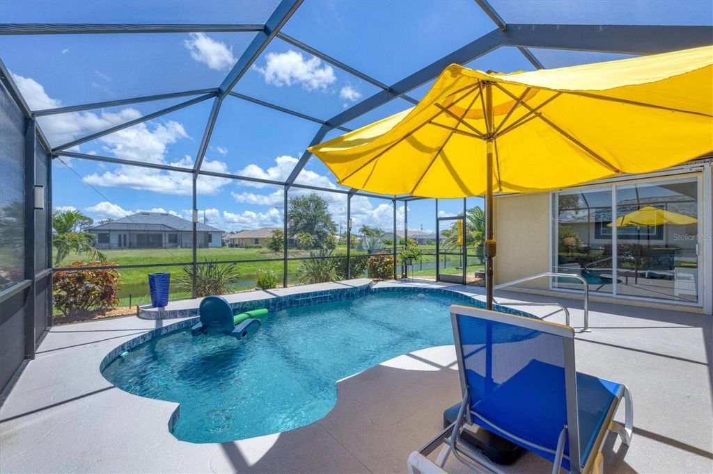 Photo of 74 Broadmoor Lane, Rotonda West, FL 33947 (MLS # N6140099)