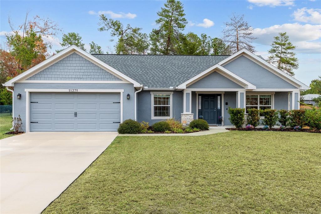 Photo of 11275 SW 54th Circle, Ocala, FL 34476 (MLS # OM717554)