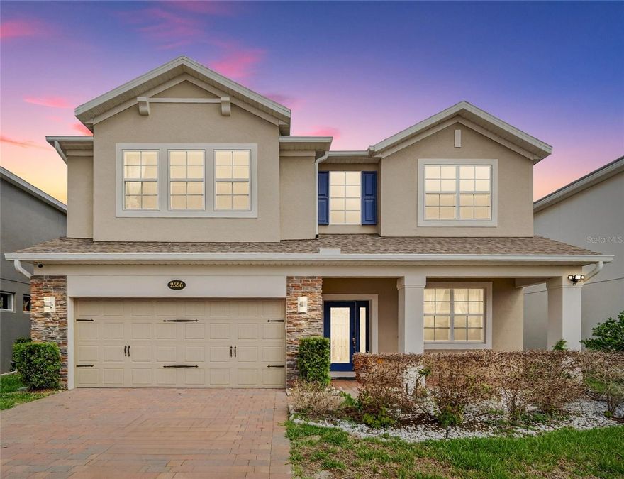 One or more photo(s) has been virtually staged. Welcome to an exceptional opportunity in the gated community of Cadence Park in Sanford—where style, space, and sophistication come together in this beautifully upgraded 5-bedroom, 5-bathroom home offering nearly 3,800 square feet of thoughtfully designed living. ***Up to 1% lender contribution toward Buyer closing cost may be available for accepted offers with loans originated by Seller's Preferred Lender by April 30, 2026. Buyer must qualify. Limitations, terms, and conditions apply.

From the moment you walk in, you’re greeted by soaring ceilings, a dramatic iron staircase, and custom accent walls that create an unforgettable first impression. The open-concept design seamlessly blends everyday comfort with elegant entertaining, flowing into a formal dining space and expansive living area ideal for hosting or relaxing in style.

The chef-inspired kitchen is truly the heart of the home, featuring sleek quartz countertops, custom cabinetry, a designer backsplash, built-in oven and microwave, an oversized breakfast bar, and a butler’s pantry—perfect for effortless entertaining and organization.

The main level offers a private bedroom with en-suite bath, ideal for guests or multi-generational living, along with an additional full bath for convenience. Upstairs, retreat to the luxurious primary suite, complete with a spa-like bathroom featuring dual vanities, a soaking tub, and a spacious walk-in shower. A large loft and generously sized secondary bedrooms—including another en-suite—provide flexible space for a home office, media room, or play area.

Step outside to your covered lanai and enjoy Florida living at its finest, with plenty of room to unwind or entertain. Throughout the home, you’ll find upgraded tile flooring, designer lighting, and high-end finishes that elevate every space.

Located in a sought-after gated community with desirable amenities and close proximity to shopping, dining, and major highways—this home offers the perfect blend of luxury, comfort, and convenience.

Homes like this don’t come around often—schedule your private showing today and experience it for yourself.