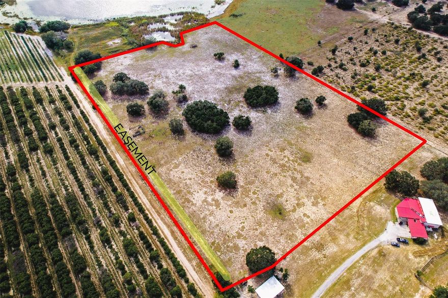 HIGH AND DRY 14.5 ACRES +/- WITH ACCESS TO LAKE TRASK. This beautiful piece of property is located in Haines City but very close to Dundee. Its mostly cleared and currently has cattle occupying it. The property runs down almost to the lake and has a 50 ft. easement offering access. The land also has a road easement offering access to it. Its fully barbwire fenced with access gates. The property can be divided into several parcels if needed and is a wonderful setting for homes considering the slopping views of Lake Trask. THE SELLER IS WILLING TO FINANCE A PORTION OF THE PURCHASE WITH FAVORABLE TERMS.