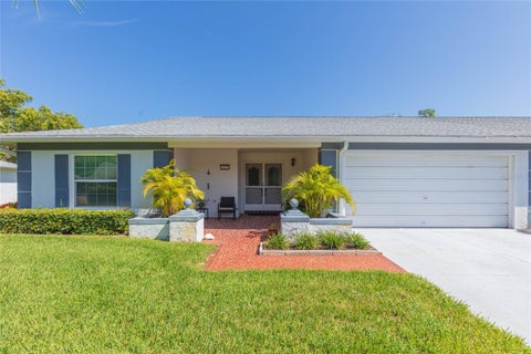 Photo of 8423 Pebble Drive, Port Richey, FL 34668 (MLS # TB8538309)