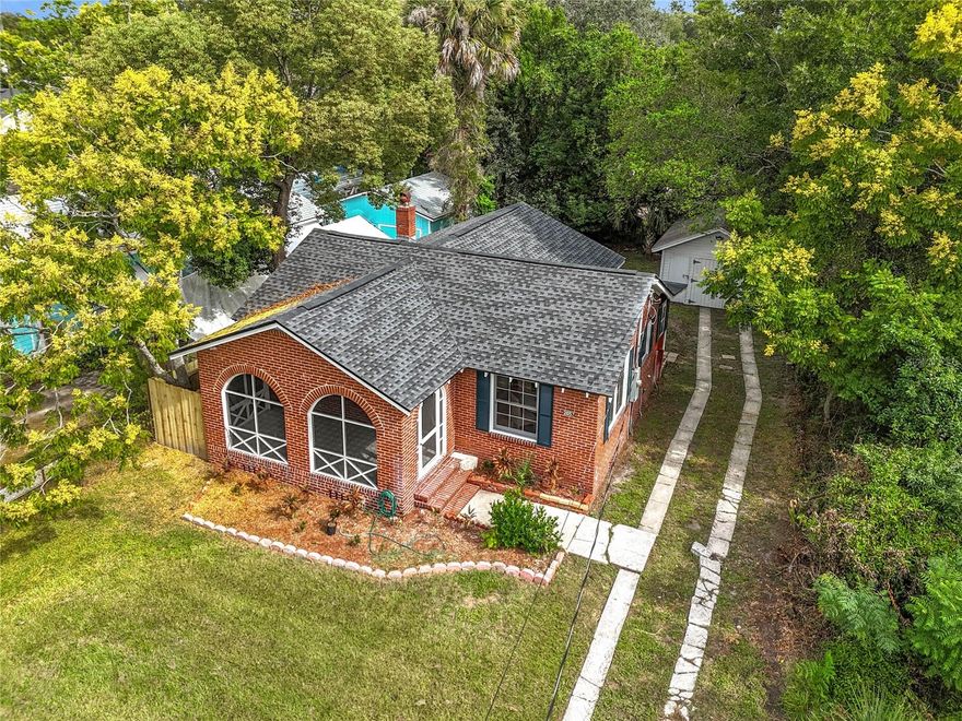 Picture yourself savoring that first sip of morning coffee on your private screened porch, serenaded by the gentle chorus of birds chirping and singing as you watch the world gently awaken around you. This enchanting all-brick sanctuary has been lovingly transformed into a haven where every detail whispers comfort and tranquility. With two bedrooms and one bathroom flowing across 927 square feet of beautifully renovated space, this home embraces you with the warmth and security that only solid brick construction can provide.

The heart of your new sanctuary features a stunning kitchen where culinary dreams come alive—imagine preparing intimate brunches for cherished friends against a backdrop of elegant granite countertops and pristine cabinetry. Gleaming stainless steel appliances await your personal touch, while luxurious vinyl plank flooring creates seamless flow throughout your peaceful retreat.

Every evening promises relaxation on your generous screened porch, perhaps sharing a glass of wine as gentle breezes carry the day's stresses away. The fresh new roof overhead offers reassuring protection for all your treasured moments within these walls.

Nestled minutes from both the historic charm of San Marco and downtown Jacksonville, this move-in-ready gem places life's conveniences at your fingertips—from the vibrant city's dining scene, entertainment venues, and bustling business district to Interstate 95 access for effortless commuting to Baptist South hospital, delightful restaurants, Publix for weekend grocery runs, and charming local shops. Bishop Kenny High School and convenient Kings Avenue transit stations enhance the lifestyle appeal, while the majestic Treaty Oak adds natural wonder to your neighborhood story.

This completely renovated home awaits your personal flourishes—whether fresh flowers on granite counters or family photos adorning pristine walls. Here, modern comfort meets established community charm, creating the perfect backdrop for writing your next chapter in a place where coming home feels like a warm embrace.