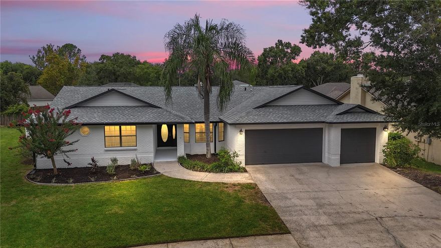 Stunning Renovation in Erin Arbor..This beautifully remodeled residence offers a refined blend of modern design and timeless elegance. Thoughtfully updated inside and out, the home is move-in ready and sure to impress even the most discerning buyer. A brand new GAF shingle roof with peel-and-stick underlayment was installed in July 2025, offering both durability and potential savings on homeowners insurance—buyers are encouraged to consult their insurance provider regarding the benefits of peel-and-stick roofing.Freshly painted throughout, the home’s interior features Sherwin-Williams’ 2025 trending color “Snowbound,” setting a sophisticated and airy tone across every space. New luxury waterproof vinyl plank flooring extends throughout the entire home, offering both style and functionality. Every interior door has been replaced with sleek two-panel shaker doors, and the trim and baseboards have been upgraded to oversized 6-inch profiles, adding a subtle farmhouse elegance to the interior.
The centerpiece of the home is a beautifully designed kitchen that effortlessly blends form and function. Custom "slim shaker" cabinetry in white and warm white oak tones provides a modern yet inviting aesthetic. A stunning super-jumbo Carrera quartz island comfortably seats up to eight people and anchors the space, while also housing a large farmhouse sink and cabinetry on both sides for exceptional storage. The kitchen is equipped with high-end Samsung Family Hub smart appliances, including a refrigerator, oven, and dishwasher, all compatible with Amazon Alexa and other smart home systems. The built in microwave cabinet keeps that appliance housed in its own place. A stunning tile backsplash completes the look, creating a truly impressive space for cooking, gathering, and entertaining.Both bathrooms have been fully renovated with luxury in mind. The guest bath features Edward Martin Leona 12x12 matte porcelain checkerboard tile in Calacatta and Amani Grey, a new double vanity, a tiled bath/shower surround, and a generously sized linen and storage closet. The spacious primary suite features soaring cathedral ceilings and a custom barn door that opens to a beautifully appointed en-suite retreat. The primary bath includes a double vanity with a dedicated makeup station, a large soaking tub, and a large dual-faucet shower with a quartz bench, all enclosed in frosted frameless glass. Coordinating Edward Martin designer tile carries throughout the space, adding a spa-like atmosphere. Dual walk-in closets complete the owner’s suite, offering ample storage and convenience.Outdoor living is equally impressive. The expansive covered patio and pool deck have been resurfaced in a sophisticated grey stone concrete finish. The patio area includes both plumbing and electrical connections, providing the perfect foundation for a future outdoor kitchen or entertaining space. Zoned for top-rated schools, including Bloomingdale High School—ranked second in academic performance across Hillsborough County, just behind Plant High—this location offers exceptional educational opportunities. The area is also seeing strong commercial development, with a new Whole Foods under construction nearby and a variety of shopping and dining options within close proximity.