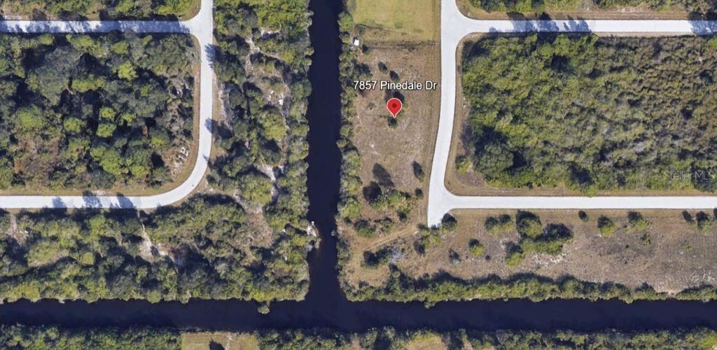 Photo of 7857 Pinedale Drive, Port Charlotte, FL 33981 (MLS # C7502024)