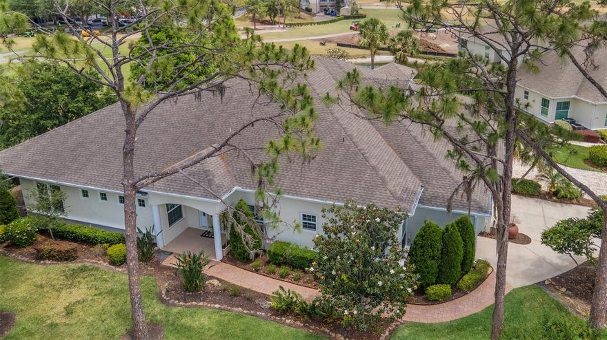 One or more photo(s) has been virtually staged. EXPERIENCE RESORT STYLE LIVING EVERY DAY in this single-story villa inside the Grasslands Golf and Country Club community! This elegant single-story townhouse/villa offers an exceptional floorplan with generously sized rooms, wood flooring, and the convenience of a maintenance free lifestyle.  The kitchen was updated in 2022, featuring new cabinets, new appliances, and more. You will be impressed by the ample storage and closet space in this remarkable home and the oversized 2-car garage PLUS separate golf cart garage. Residents of Grasslands benefit from a 24/7manned gate, underground utilities, and walker-friendly community in a location that is conveniently close to shopping, dining, medical facilities, public recreational amenities, major transportation routes and more. Discover for yourself why Grasslands is the most sought-after address in Lakeland. A minimum 12-month lease and HOA approval is required. Please note that use of facilities owned by the Grasslands Golf and Country Club is not included; however, membership options are available—please refer to the information under Attachments in MLS.