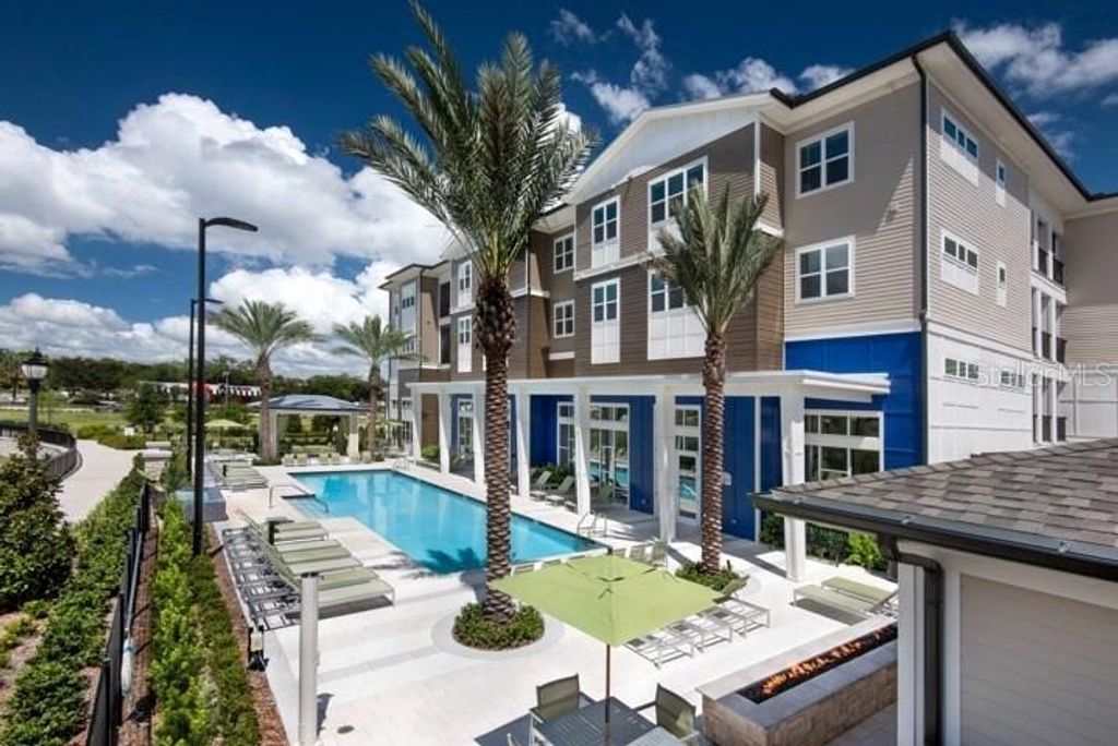 Photo of 3160 Integra Lakes Lane #B4, Casselberry, FL 32707 (MLS # O6347404)