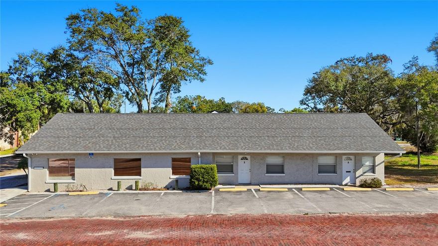 Highly visible 2,240 sq ft office building located on the corner of Tarpon Avenue and Levis Avenue in Tarpon Springs, positioned between US-19 and Alt-19 for excellent exposure and access. Currently used as a law office, the building is divided into three units, offering flexibility for owner-users or investors. Recent updates include a new roof in 2024 and exterior paint in 2024. The front unit features a reception area, large private office, conference room, utility area, kitchen, half bath, and a new A/C installed in 2025. The second unit includes new flooring and interior paint from 2023, a private office, open office or living room space, kitchenette, half bath, and an A/C replaced in 2022. The third unit offers new flooring from 2023, a new A/C in 2024, a full bath, and a kitchenette. The property features 11 dedicated parking spaces, along with additional overflow parking available through an adjacent property during the week. Prime corner location, strong visibility, and recent improvements make this a solid opportunity in a high-demand Tarpon Springs corridor. Schedule your tour today.