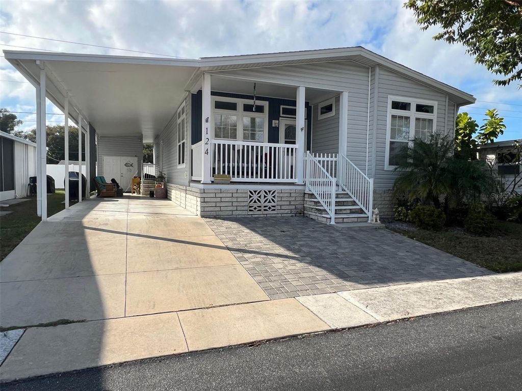 Photo of 124 Pindo Palm Street W, Largo, FL 33770 (MLS # TB8460723)