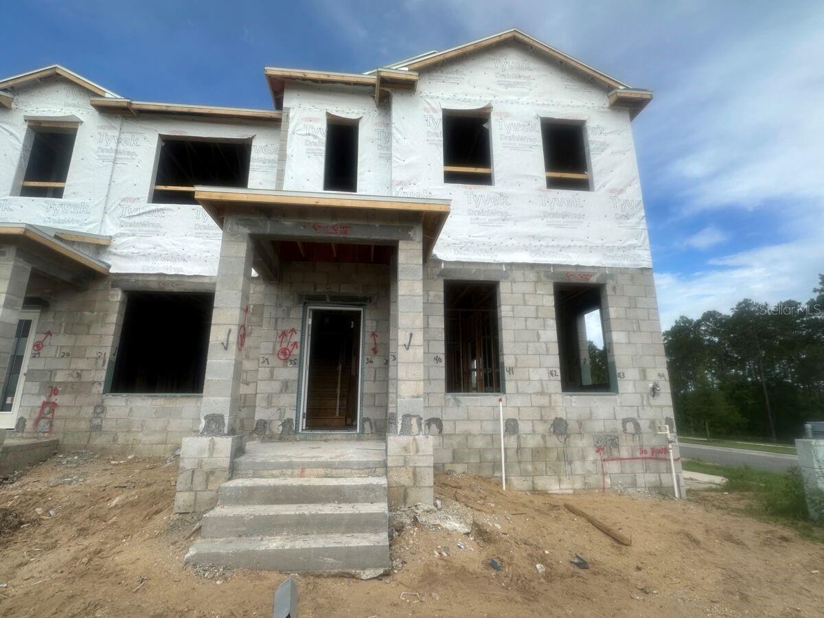 Under Construction. Discover this stunning new construction townhome at 9428 Bolshoi Alley in Winter Garden! This thoughtfully designed home features 3 bedrooms, 2.5 bathrooms, a flex room, a 2-car detached garage, and more. This townhome's design emphasizes functionality and comfort throughout. The open-concept living area creates seamless transitions between spaces, making it ideal for both relaxation and hosting guests. The townhome's layout provides comfortable accommodations for families or those seeking additional space for home offices or guest rooms. Your upstairs owner's bedroom provides a private retreat away from the main living areas. Located in the desirable Winter Garden area, this home offers proximity to beautiful parks and recreational opportunities. The neighborhood provides a welcoming environment with well-planned streets and quality design standards that enhance the overall appeal of the area.