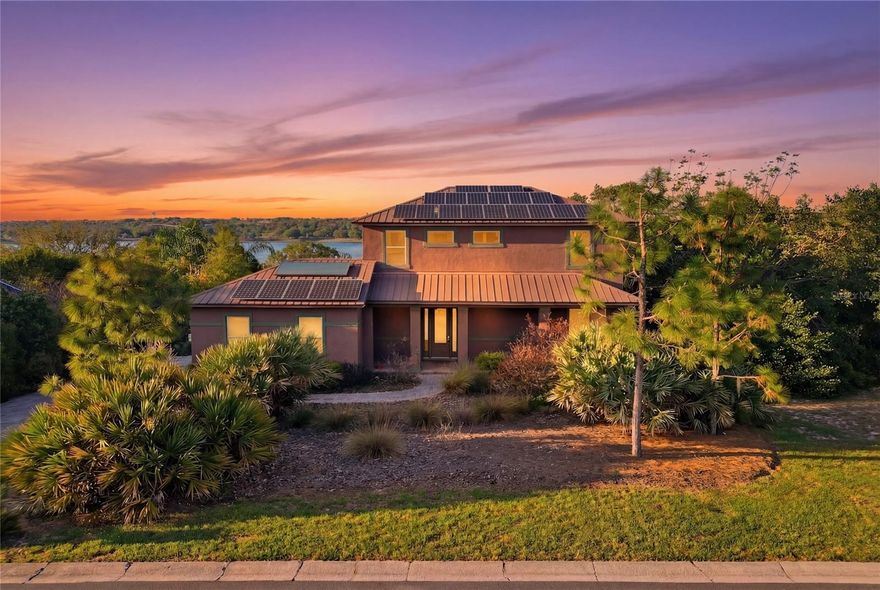 Welcome to your own private retreat in the heart of Lake Wales! This beautiful 4-bedroom, 3-bath home sits on an oversized double lot, offering space, privacy, and endless possibilities to truly make it your own.

From the moment you arrive, you’ll appreciate the natural surroundings and peaceful setting, while still being just minutes from downtown, shopping, dining, and Lake Wailes. The expansive lot gives you room to create, whether it’s adding a pool, garden, outdoor entertainment area, or simply enjoying the extra space and privacy.

Inside, the home offers a functional and inviting layout perfect for both everyday living and entertaining. A convenient first-floor bedroom and full bathroom provide flexibility for guests, in-laws, or a home office. The open living areas flow beautifully and connect to a covered, screened lanai, ideal for relaxing evenings or weekend gatherings.

Upstairs, the spacious primary suite is a true highlight, featuring large windows that frame peaceful lake views and fill the space with natural light. It’s the perfect place to start your morning or unwind at the end of the day.

This home also comes with fully paid-off solar panels, giving you energy efficiency and long-term savings, an incredible bonus for today’s buyers.

With its unique combination of space, location, lake views, and future potential, this property is more than just a home, it’s an opportunity. Schedule your private showing today and come experience everything this special property has to offer.