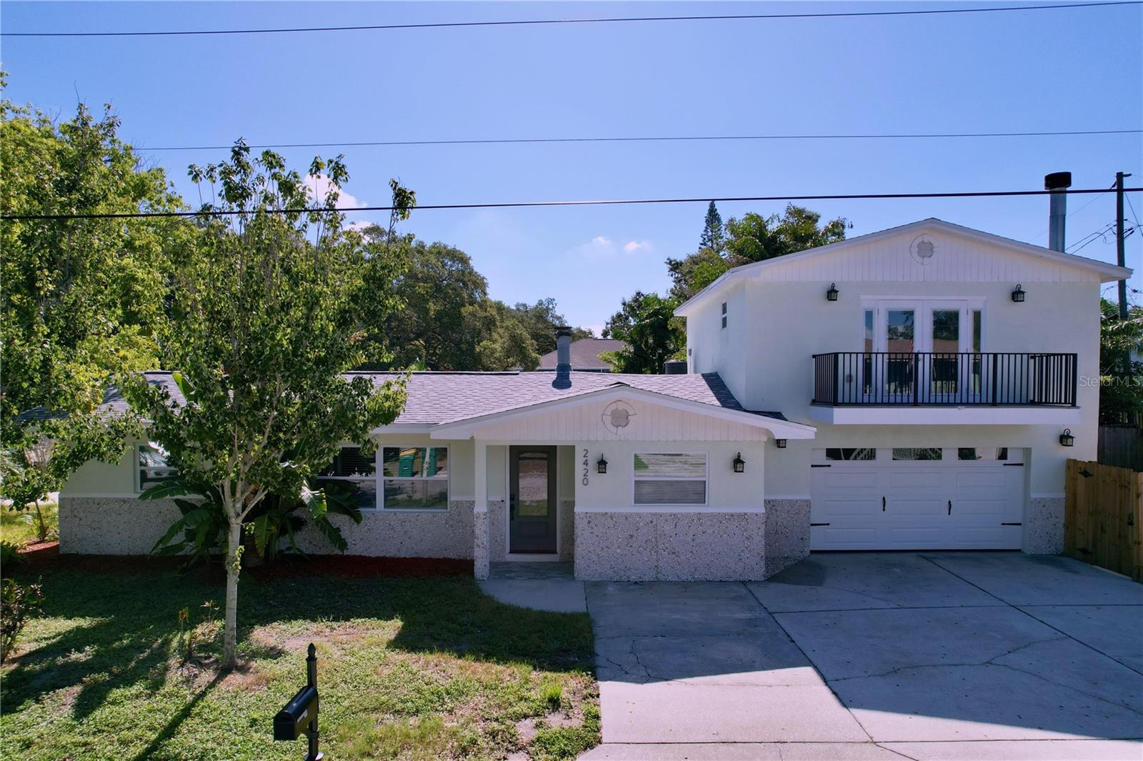 Don’t miss your chance to own this fully renovated 3-bedroom, 2-bathroom home located in a golf cart-friendly neighborhood in Palm Harbor. This corner lot sits steps away from the Pinellas trail with easy access to Crystal Beach and Palm Harbor the home offers the perfect blend of laid-back coastal living and modern convenience. Step inside to find a bright and open floor plan with all-new finishes throughout. The remodeled kitchen features quartz countertops, stainless steel appliances, and new cabinetry. Both bathrooms have been thoughtfully updated with contemporary fixtures and finishes, giving the home a fresh feel. The home features two fireplaces, the downstairs fireplace is wood burning and the second one is an electric fire place located upstairs in the primary bedroom. Enjoy peace of mind with recent upgrades including new flooring, roof, HVAC, and updated plumbing and electrical systems. Whether you're cruising to the beach, grabbing coffee in town, or relaxing in your backyard, this home offers the lifestyle you’ve been dreaming of. Zoned for top-rated schools and close to local parks, dining, and shopping.