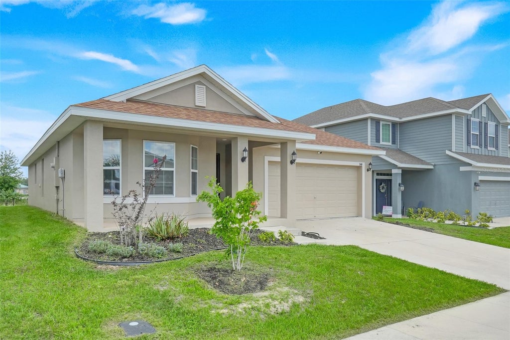 Photo of 140 Krenson Bay Loop, Winter Haven, FL 33881 (MLS # G5113525)