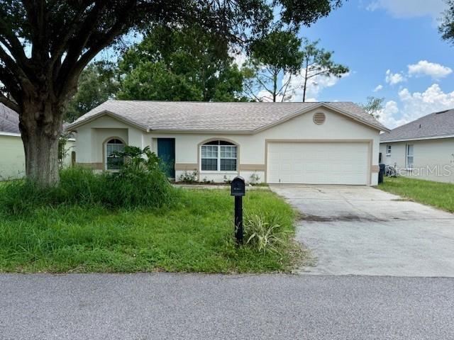 Welcome to 424 St Anns, in beautiful SE Winter Haven! This charming single-family home offers 3 spacious bedrooms and 2 bathrooms, perfect for comfortable living. Step inside to vaulted ceilings that create an open and airy atmosphere throughout the split floor plan. The inviting living room features sliding doors that lead to a screened enclosed lanai—ideal for relaxing or entertaining while enjoying the outdoors.
The eat-in kitchen is equipped with a convenient closet pantry and a breakfast bar, making meal prep and casual dining a breeze. You'll find a mix of cozy carpet and easy-to-maintain linoleum flooring throughout the home. The master bedroom boasts a walk-in closet and a private shower, providing a peaceful retreat.
Outside, enjoy the shade of a mature oak tree in the yard, adding natural beauty and charm. The attached 2-car garage includes washer and dryer hookups for added convenience. Recent updates include a new roof and A/C system installed in 2021, ensuring comfort and peace of mind.
With 1,012 sqft of living area and a total of 1,408 sqft under roof, this 1994-built home combines functionality with classic appeal. Don’t miss the opportunity to make this lovely Winter Haven property your new home!
Enjoy convenient access to local stores and restaurants, as well as being just a short drive from LEGOLAND. Plus, you'll have easy access to Highway 27, making your travels smooth and hassle-free!