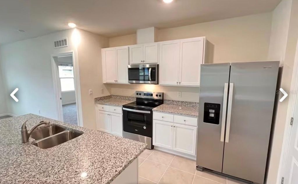 Photo of 2073 Doe Run Drive, Davenport, FL 33837 (MLS # S5148093)