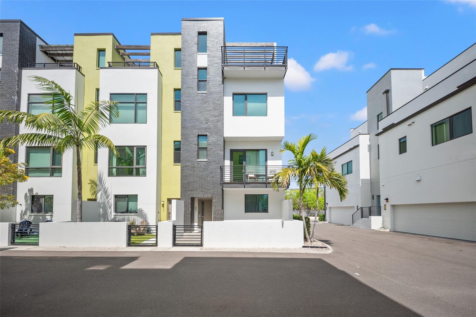 Experience urban luxury living in the heart of Downtown St. Pete at 907 N. Arlington Ave. From vibrant dining and boutique shopping to art galleries, waterfront parks, and buzzing nightlife, everything you love about the city is just moments from your front door, no car required.
One of downtown’s rare gems, this residence features an attached two-car garage for effortless, private entry. Forget elevators, parking garages, or lugging groceries through long hallways, simply pull in, step inside, and you’re home.
The bright, open interior blends modern finishes with thoughtful design, creating a perfect backdrop for both relaxation and entertaining. Upstairs, a private rooftop balcony offers sweeping city views: ideal for morning coffee, sunset cocktails, or starlit evenings.
With unmatched convenience, secure parking, and elevated style, this home delivers the best of city living in one exceptional package.