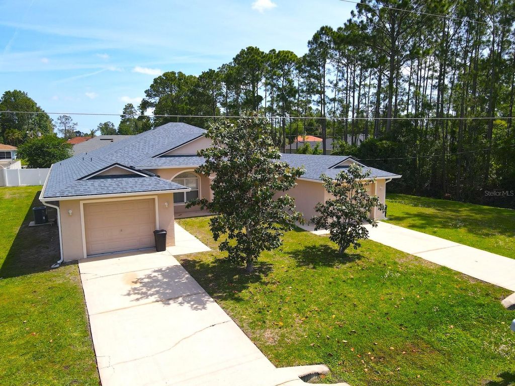 Photo of 14 Buttonwood Lane, Palm Coast, FL 32137 (MLS # FC317881)