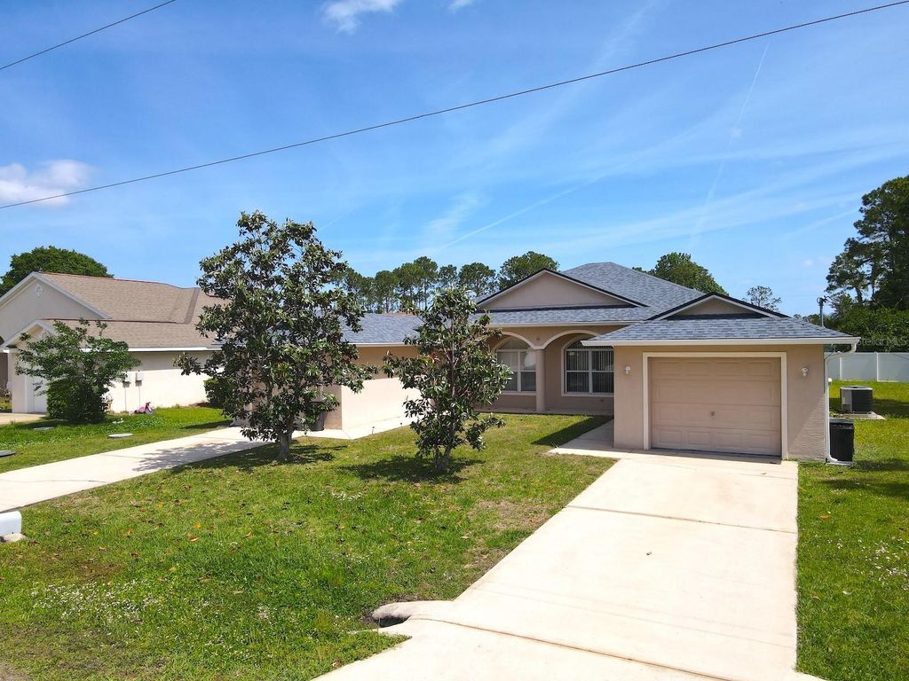 Photo of 14 Buttonwood Lane, Palm Coast, FL 32137 (MLS # FC317881)