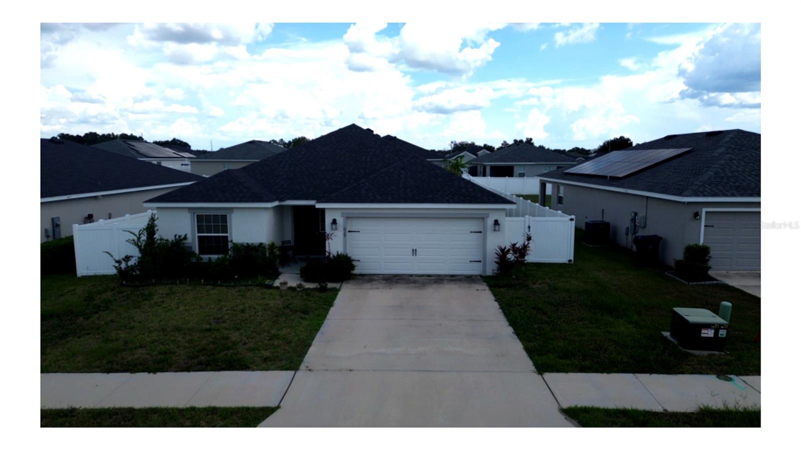 Welcome to the Serendipity at 629 Fairhope Dr, Polk?City, FL 33868
This stunning one-story Serendipity floor plan by Highland Homes, built in 2021, offers 2,004 sq?ft of thoughtfully designed living space on an 8,307 sq?ft lot in lovely Auburn Cove. The home first welcomed its owners in late 2023 and is an excellent showcase of modern, functional Florida living .
Key Features & Highlights
3 bedrooms, 2 baths + versatile den bonus room that can be a 4th bedroom Just added brand new French doors. – The entryway leads into a cozy den—ideal for a home office or quiet retreat .
Open-concept living – A bright gathering room with volume ceilings flows seamlessly into a sunny dining cafe and open kitchen featuring a counter-height island and walk-in pantry . Added new upgraded Washer, Dryer. As well as added luxury vinyl flooring in all the bedrooms.
(no carpet)
Owner’s suite retreat – Spacious primary suite with elegant tray ceiling, dual walk-in closets, and a luxurious en-suite bathroom furnished with dual vanities, tiled shower, and a private water closet .
Functional layout – A mud/drop-zone by the garage entry keeps keys and bags organized; dedicated laundry room; hall bath boasts double sinks .
Outdoor living – Enjoy a covered front porch and a covered rear lanai directly off the gathering room—perfect for outdoor gatherings or quiet evenings .
Two-car garage with convenient access to the home’s entryway .
Four exterior elevations to fit your style—from stucco to coastal siding with stone accents .
Added on new fence vinyl for privacy. Also added screen to screen in porch
Interior & Exterior Amenities
Volume ceilings in main living areas, flat ceilings in bedrooms
Grand entry foyer with adjacent coat/storage closet
Large walk-in pantry
Multiple finish package options with upgrades available
No CDD fees; modest HOA ($50/month)