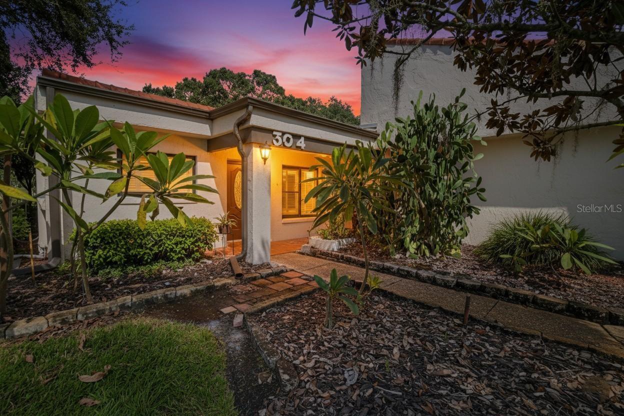 Welcome to this charming, well-maintained three-bedroom, two-bath villa, perfectly positioned with an outstanding view. The kitchen boasts elegant stone countertops, while cathedral ceilings and abundant natural light create an airy, inviting atmosphere throughout. A bright and spacious Florida room provides the perfect spot to relax or entertain as you take in the serene scenery. The exterior of the home is maintained for the seller’s convenience, and a roomy two-car garage offers plenty of storage. A versatile bonus room is ideal as an office, den, or hobby space. With timeless finishes, an affordable price, and a prime location, this villa offers the perfect blend of comfort, style, and ease of living.