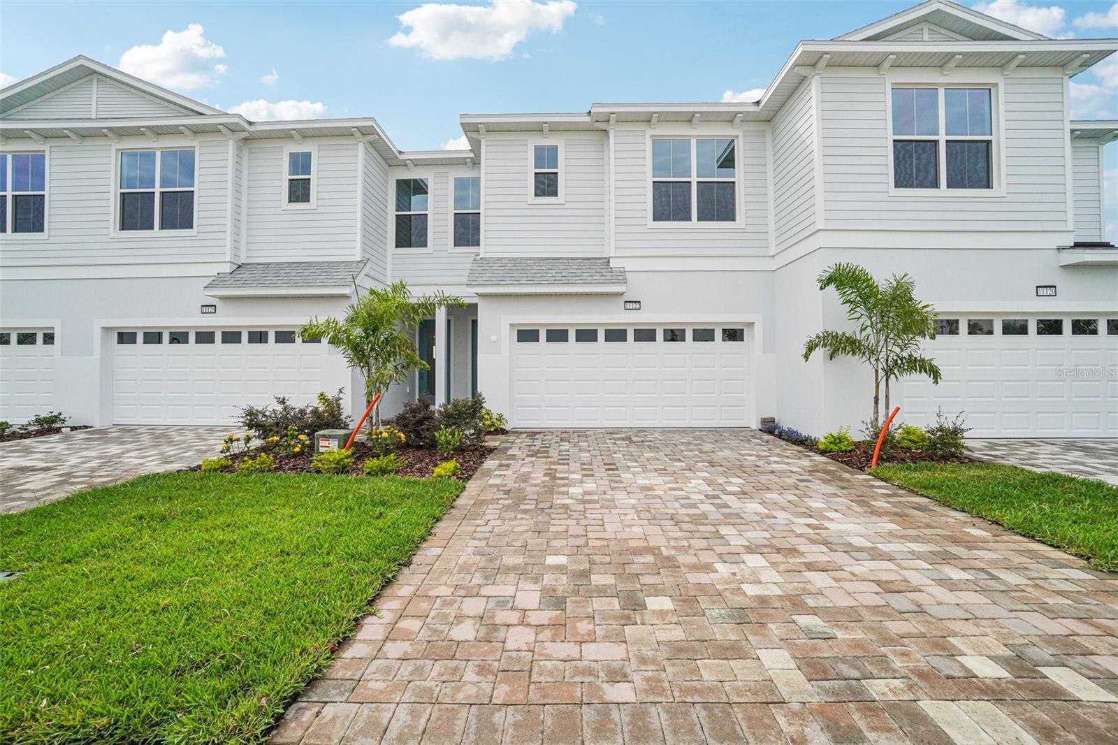 Embrace coastal elegance in this impeccably crafted 3-bedroom, 2.5-bath townhome located in the sought-after gated community of the Lagoon Residences at Mirada. Showcasing luxury vinyl flooring throughout, this residence combines timeless style with everyday ease. Enjoy peaceful lagoon views from the spacious, light-filled interior and private lanai. Designed with an open layout, soaring ceilings, and upscale finishes, this home offers a perfect balance of comfort, sophistication, and functionality.