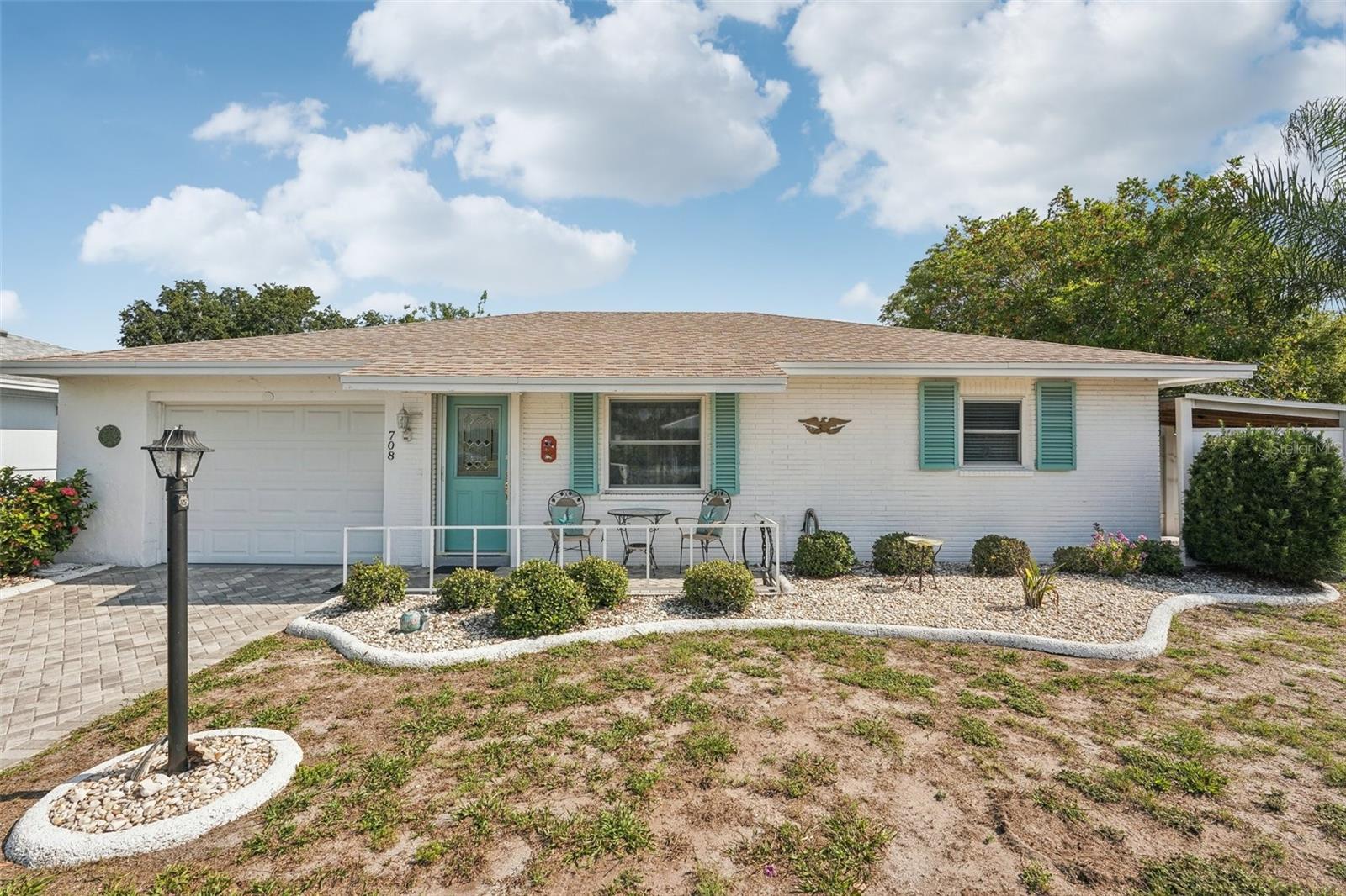 Welcome to carefree retirement living in the vibrant and friendly 55+ community of Sun City Center, Florida. This beautifully updated 2-bedroom, 1.5-bath home offers 1,200 square feet of charm and comfort, and is ready for you to call home! Ideally located just a
short golf cart ride to the community’s many amenities, this home makes it easy to enjoy everything Sun City Center has to offer. You’ll
immediately notice the inviting curb appeal with a brick paver driveway and walkway installed in 2018 and resealed in 2023. The home also
features an extra-wide single-car garage with a retractable screen door added in 2021. The shingle roof was replaced in 2015, adding peace of mind. Inside, the light and bright neutral decor was refreshed in 2018 and is complemented by textured ceilings, crown
molding, and beautiful laminate flooring installed in 2017 throughout the main living areas. The owner’s suite includes its own private ensuite bathroom with a beautifully tiled walk-in shower completed in 2019 and an upgraded shower door in 2024. The spacious, open kitchen features attractive cabinetry, tile countertops, Whirlpool stainless steel SMART appliances installed in 2018, and a brand new microwave. The interior laundry room includes a washer and dryer also from 2018, and offers convenient access to both the garage and the backyard. One of the home’s standout features is the enclosed 12-by-12 glass sunroom, added in 2018. This space is under air and completely hurricane-proof. It offers lovely views of the expansive natural area and golf course behind the home. Whether you’re entertaining or simply enjoying a quiet moment, this room adds the perfect touch of tranquility and extra living space. Additional updates include a newer air conditioning system installed in 2021. The electrical panel was replaced in 2017, the water heater in 2015, and the plumbing was completely re-piped. Hurricane shutters are installed on all windows, with the exception of the hurricane-rated sunroom. This home is centrally located in the heart of Sun City Center, close to shopping, dining, social clubs, pools, the community library, and banking. It also offers easy access to major highways, airports, Tampa, Sarasota, and Florida’s award-winning beaches. If you're looking for a comfortable, well maintained home in a lively and welcoming 55+ community, this one checks all the boxes. Rent includes water and maintenance of the grounds! First, Security, and Pet Deposit due for move in. Schedule a tour today!