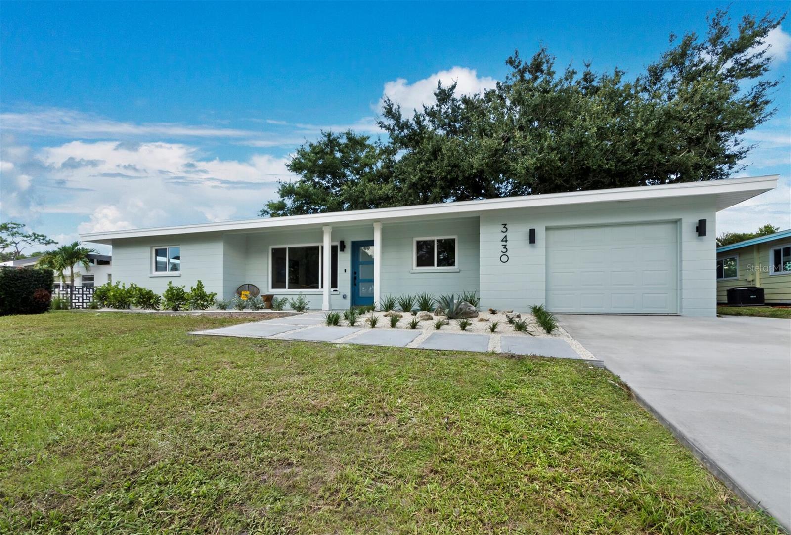 Refined Mid-Century Living in the Heart of Sarasota. Nestled in the coveted South Gate neighborhood and top-rated Southside Elementary, this exceptional mid-century ranch has been thoughtfully reimagined for today’s discerning homeowner. Every detail has been elevated — from a newer roof and full re-piping and rewiring to all-new impact-rated windows and doors, ensuring both style and peace of mind. Original oak parquet flooring has been carefully restored and enhanced, while the reconfigured open layout maximizes space, light, and flow. The heart of the home — a designer kitchen with bespoke cabinetry, solid surface countertops, and premium appliances — effortlessly blends elegance with functionality. Luxe, spa-inspired bathrooms and curated finishes throughout exude understated sophistication. Outside, a generously sized backyard sits high and dry, shaded by mature trees and ready for a future pool (a professional plan is already in hand). Just minutes to vibrant downtown Sarasota, Siesta Key’s award-winning beaches, and an easy drive (or Uber) to SRQ Airport, this is coastal Florida living at its most refined.