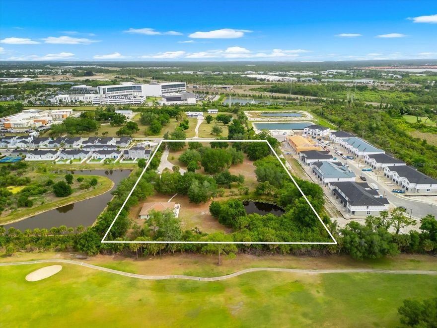 This 5.01-acre parcel is strategically positioned near the new Sarasota Memorial Hospital – Venice campus on Laurel Rd, placing it at the center of one of South Sarasota County’s most rapidly expanding corridors. The area is experiencing significant commercial and residential growth, including the planned development of major national retailers and dining destinations such as Walmart, The Home Depot, Texas Roadhouse, Chili's, Panda Express, Chick-fil-A, Panera Bread, and Whataburger, further reinforcing the long-term growth trajectory of this location.

Featuring 327 feet of frontage on Curry Lane, the property is currently zoned RMF-1 (5 units per acre), with neighboring parcels zoned OUE, OPI, and RMF-3, offering strong potential for future development opportunities

Situated within an A-rated school district and located in Flood Zone X.

A 2,262 sq ft residence is currently on-site, featuring 3 bedrooms, 3 bathrooms, a dedicated office, and a loft area, offering flexibility for interim use, rental income potential, or future redevelopment.

Conveniently located just 0.8 miles to Publix, 1.5 miles to Laurel Nokomis School, and under 6 miles to both Nokomis and Venice Beaches, this property combines accessibility with strong growth fundamentals.

Opportunities of this scale, location, and surrounding development are increasingly rare—secure your position in one of the area’s most active and evolving corridors today.