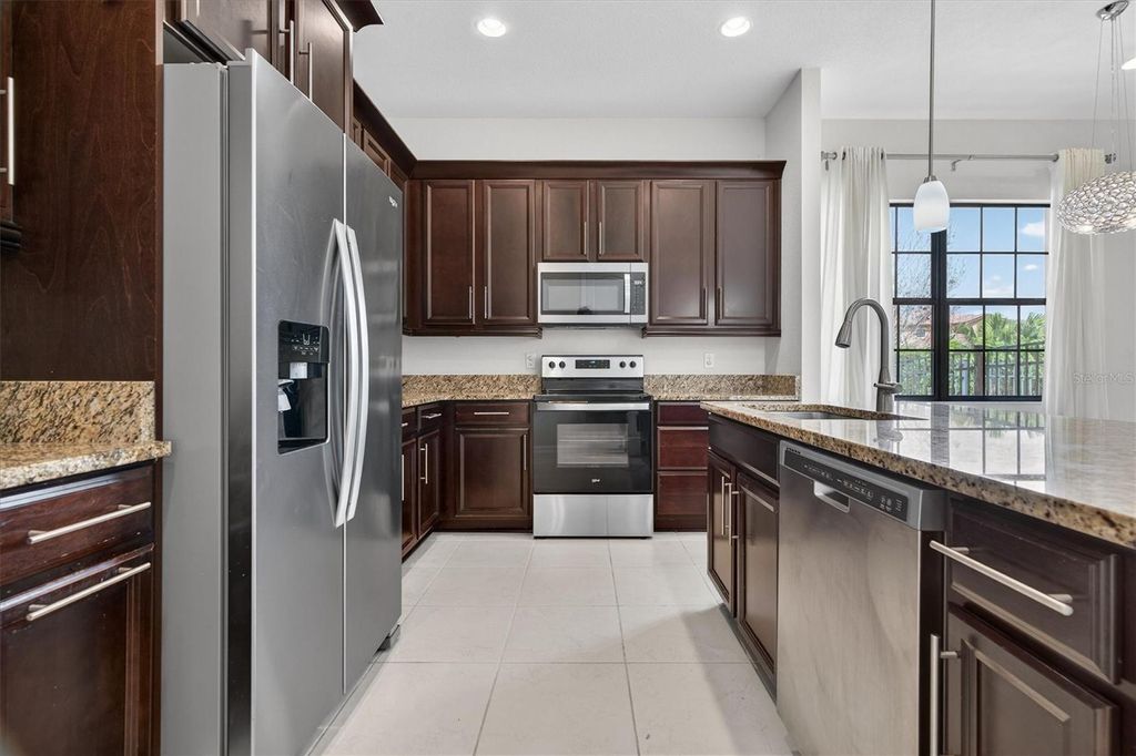 Photo of 10429 Stapeley Dr, Orlando, FL 32832 (MLS # O6397044)